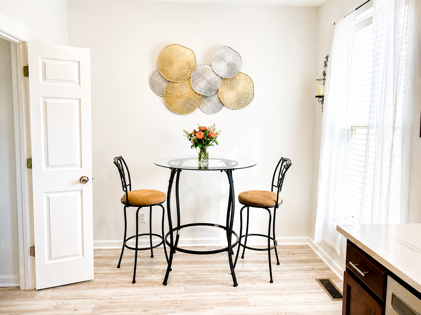 The Ashburn Residence — Kitchen breakfast nook with bistro table and natural light