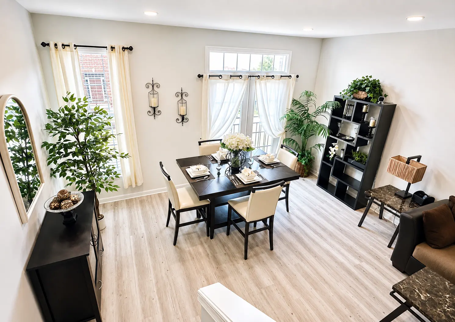 The Ashburn Residence — Open living and dining area with light wood floors
