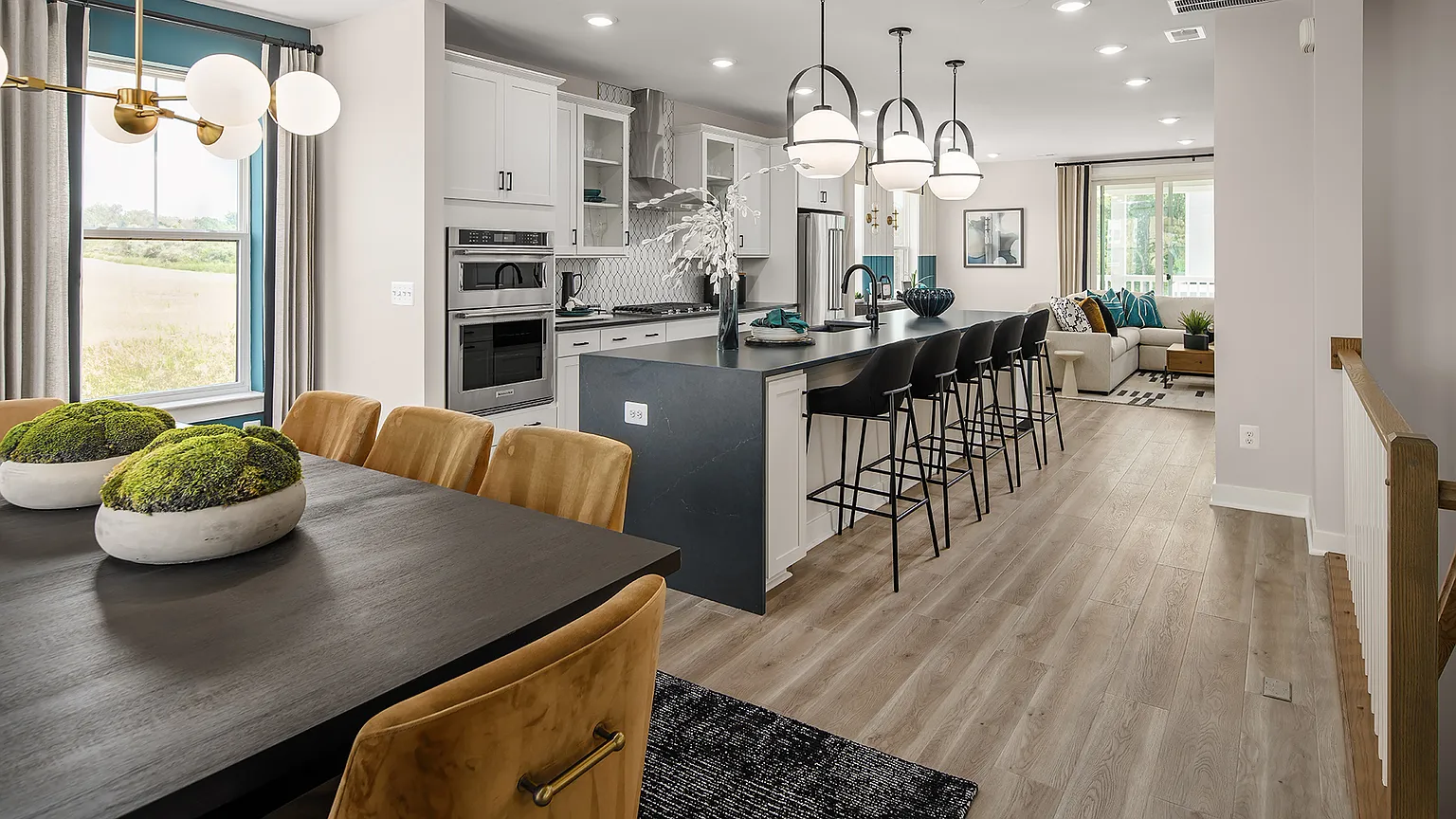 Bright open kitchen and dining area at The Kincora Residence in Sterling, Virginia